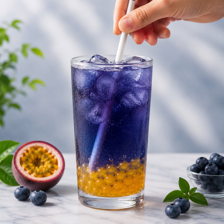 Blueberry sugar syrup and passion fruit popping boba